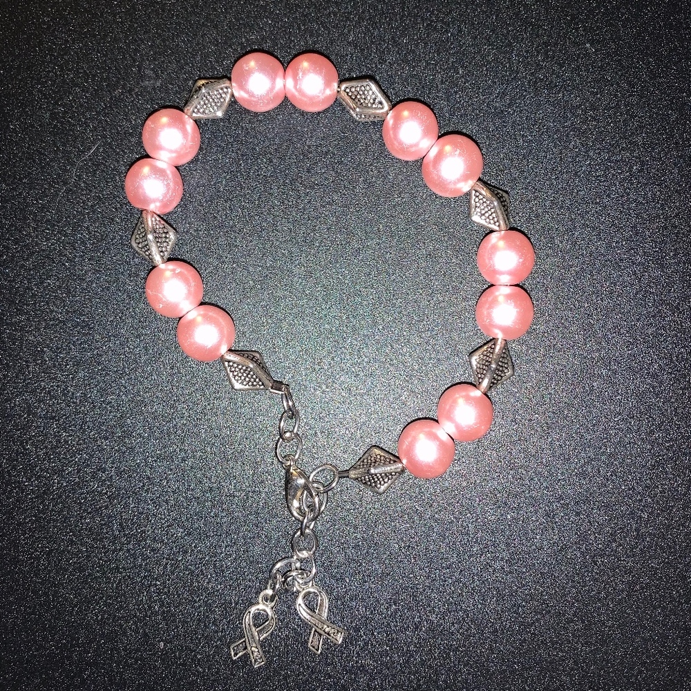 - Pink beaded bracelet pink ribbon charms